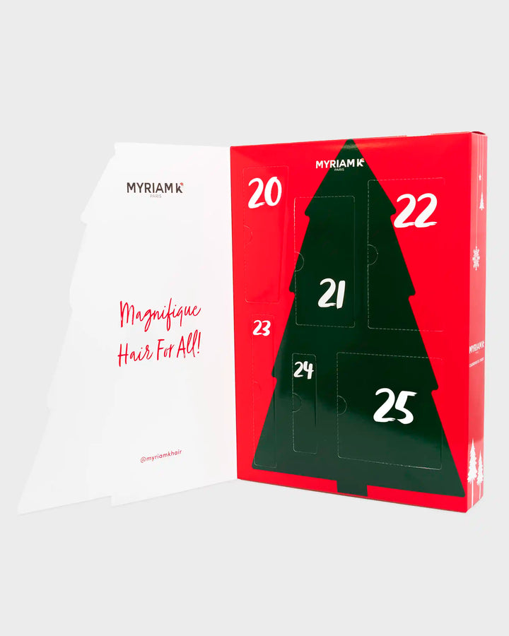 Calendrier de l’Avent Myriam•K Paris ouvert révélant les produits capillaires exclusifs et miniatures de la collection