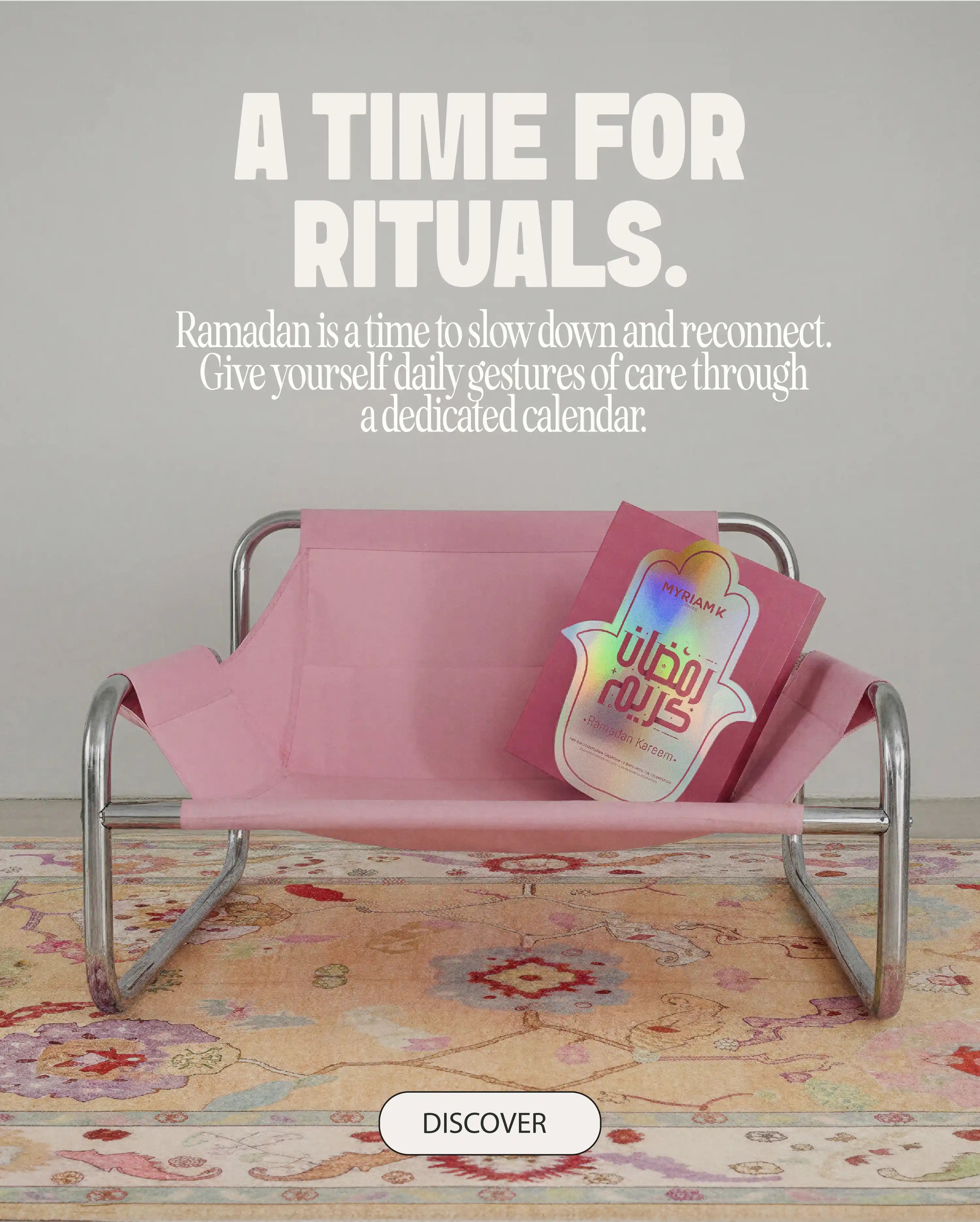 Myriam•K Paris Ramadan ritual calendar on a pink bench, soft minimalist setting focused on daily care and mindfulness.