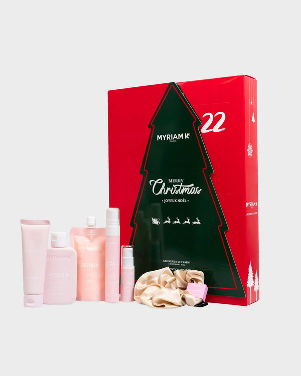 Calendrier de l’Avent Noël Myriam•K Paris ouvert, révélant les produits capillaires et soins beauté inclus, édition premium pour les fêtes.